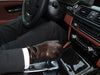 Luc chocolate brown lambskin gloves with orange cashmere cuff lining and three-point stitching, detail view of cuff