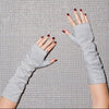 Bianca fingerless stone gloves with alligator-embossed suede back, tonal stone leather palm, silk lining, and open fingertips, back-of-hand view