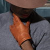Domino caramel perforated lambskin gloves with silk lining, back-of-hand view