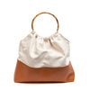 Ines canvas and leather bucket tote bag with round bamboo handle, front view