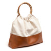 Ines canvas and leather bucket tote bag with round bamboo handle, front view