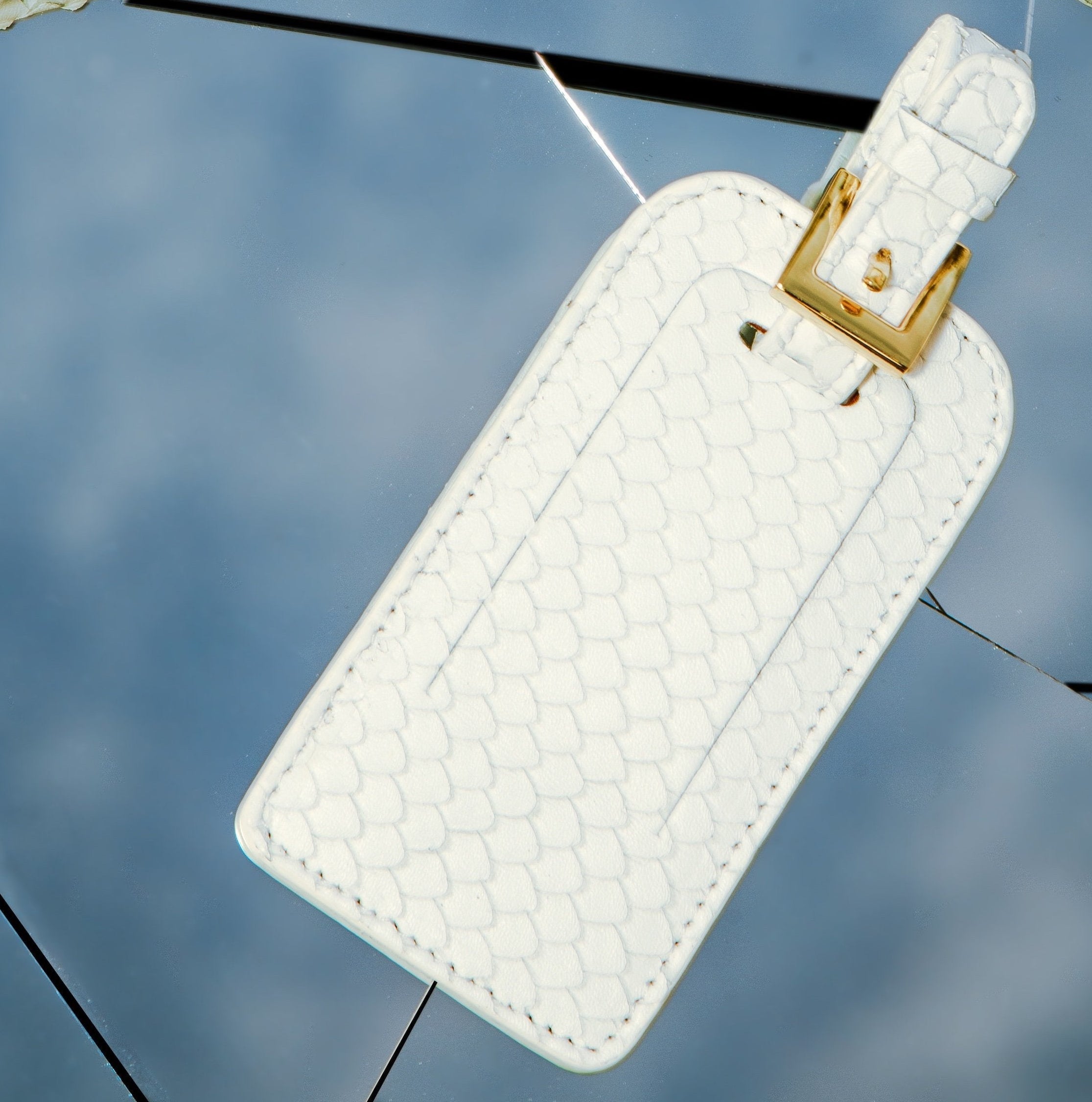 Vesper white snakeskin-embossed leather luggage tag with buckle strap