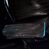 Gerard navy lambskin gloves with turquoise cashmere cuff lining and contrast turquoise stitching, back-of-hand view